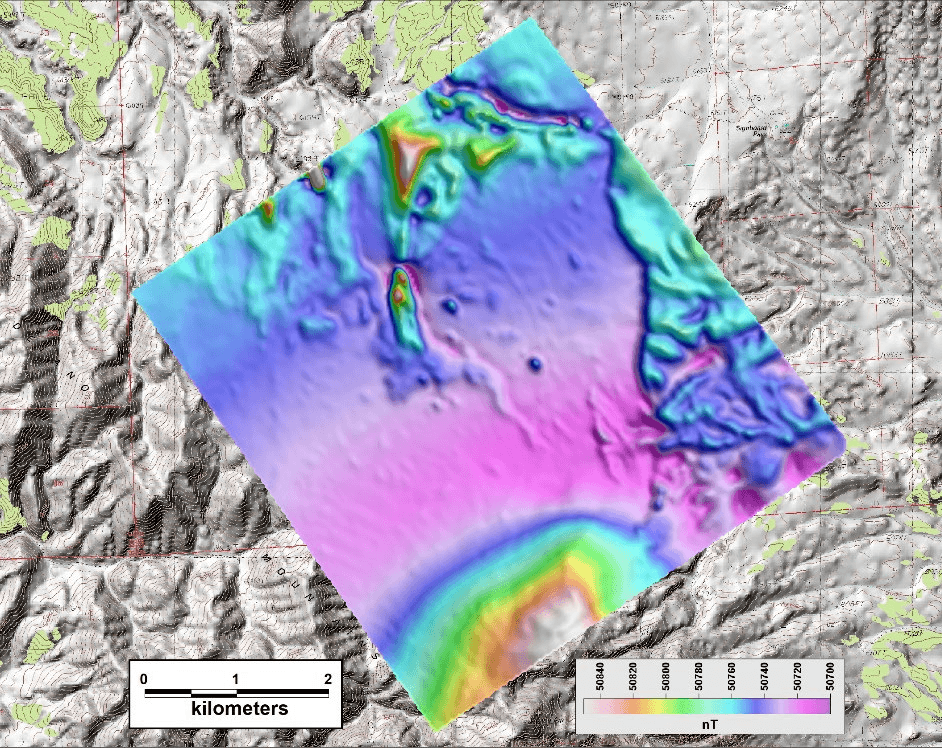 Figure 4 — total magnetic intensity of the 2026 drone survey over gray-shaded topography, with scale bar and nT colour bar
