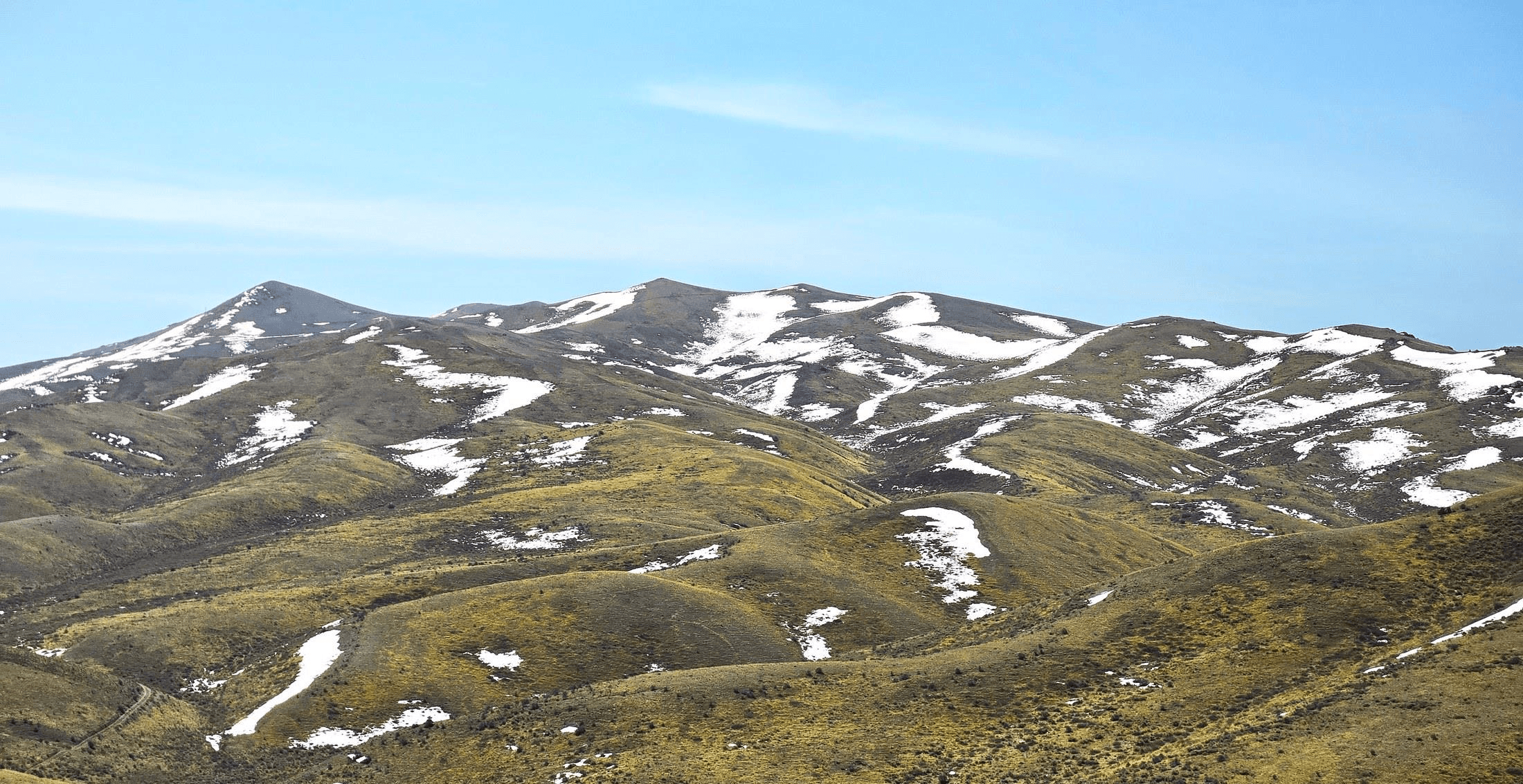 Snow-covered peaks above the district